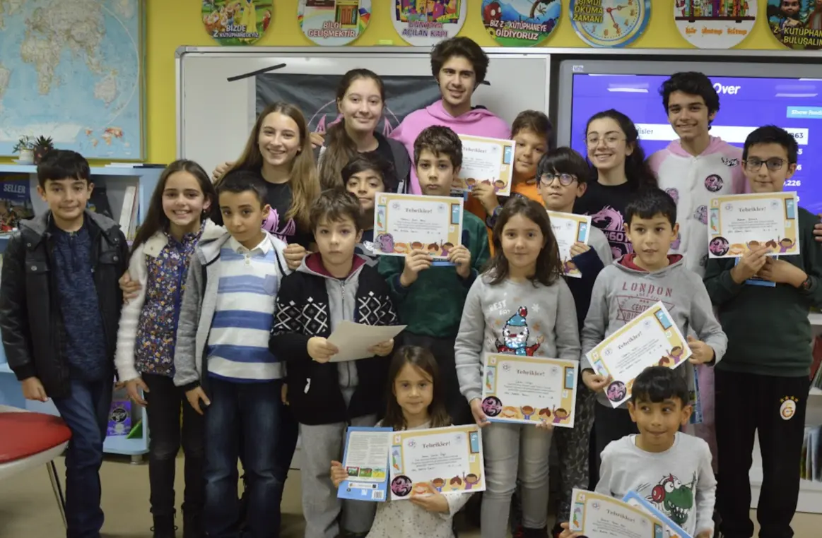 Makerspace table with tools and repurposed materials